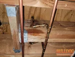 A photo of an active plumbing leak from a bathroom tub and sink in a 32-year-old townhome in the Hampton Court Nottingham subdivision of Overland Park, KS (38.9064N, 94.6951W)
