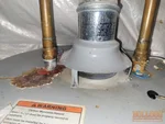Rusted 9-year-old water heater in Arbor Lake subdivision of Shawnee, KS — 66227 (38.9621N, 94.8765W)
