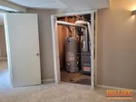 Gas furnace and water heater found in bedroom closet of a 34-year-old 2-story home in the English Gardens subdivision of Olathe, KS (38.8791N, 94.7562W).