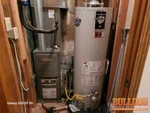 Gas furnace and water heater in the bedroom closet of 33-year-old ranch in Country Meadows North subdivision of Independence, MO — 64055 (39.0370N, 94.3818W)