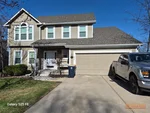 Exterior of 28-year-old 2-story home in Brooke Ridge subdivision of Kansas City, MO 64157