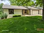 Alt Text:
Exterior of 33-year-old half duplex in Pickering Place subdivision of Belton, MO — 64012
