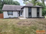 Exterior of 55-year-old raised ranch in Hunter Gardens subdivision of Grandview, MO — 64030 (38.8922N, 94.5113W)