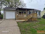 Exterior of 66-year-old ranch-style home in Salisbury Hills subdivision of Independence, MO — 64056