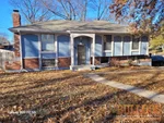 Exterior of 54-year-old ranch-style home in Coach Light Square subdivision of Kansas City, MO — 64129 (39.0238N, 94.4869W)