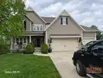 Exterior of 13-year-old 2-story home in Forest View The Hills subdivision of Olathe, KS — 66061