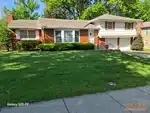 Alt Text:
Exterior of 67-year-old raised ranch in Southwood subdivision of Raytown, MO — 64138
