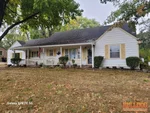 Exterior of 70-year-old 1.5-story home in Marquette Blue Ridge subdivision of Raytown, MO — 64138 (38.9761N, 94.4885W)