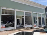 117-year-old retail storefronts at 109-111 Main St in downtown Parkville, MO — 64152