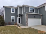 Exterior of 8-year-old 2-story townhome in Suttle Downs subdivision of Shawnee, KS — 66227