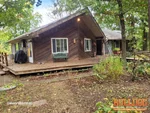 Exterior of 36-year-old ranch in historic Harrisonville, MO — 64701 (38.5232N, 94.3184W)