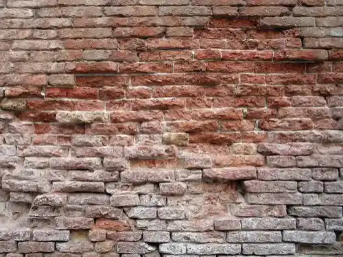 deteriorated and crumbling bricks and mortar