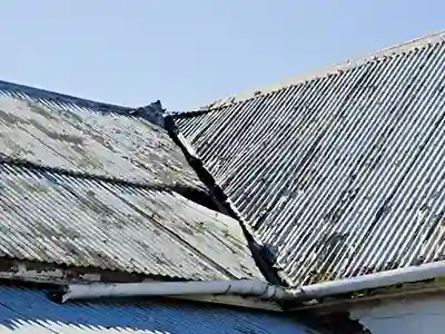 old and damaged metal roof