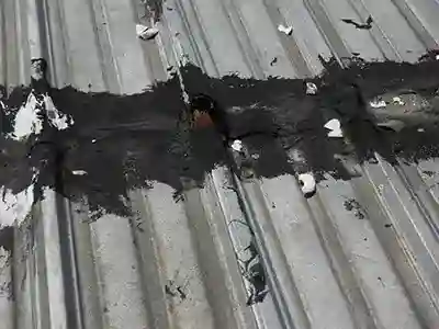 patched leak at metal roof