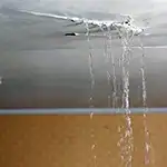 waterfall through living room ceiling