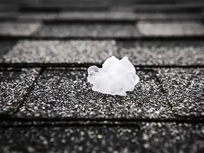 what the hail - gnarly piece of spiky hail on a roof
