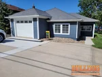home-inspection-lake-lotawana-mo-9-p-st-64086-38.913409N-94.244156W-bulldog-home-inspections-2025-06-20 Exterior photo of 67-year-old vacant ranch-style home inspected at 9 P St, Lake Lotawana, MO 64086 (38.9134N, 94.2442W)