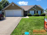 home-inspection-lone-jack-mo-212-black-jack-ave-38.866840N-94.170456W-bulldog-home-inspections-2025-06-19 Exterior photo of vacant 19-year-old ranch inspected at 212 Black Jack Ave, Lone Jack, MO 64070 (38.8668N, 94.1705W)