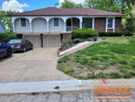 Exterior photo of 48-year-old vacant ranch home inspected at 8008 Greenwald Dr, Belton, MO 64012 (38.8247N, 94.4974W)