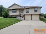 home-inspector-grandview-mo-4700-e-136th-ct-64030-38.87765050N-94.53825800W-bulldog-home-inspections-2025-06-11 Exterior photo of 7-year-old occupied split level home inspected at 4700 E 136th Ct, Grandview, MO 64030 (38.8777N, 94.5383W)