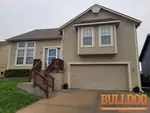 home-inspector-kansas-city-mo-12327-atkins-ave-64163-39.31657540N-94.67206200W-bulldog-home-inspections-04-18-2025 Exterior photo of 18-year-old split-level home inspected at 12327 Atkins Ave, Kansas City, MO 64163 (39.3166N, 94.6721W)