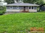 home-inspector-kansas-city-mo-4104-e-112th-st-64137-38.92350700N-94.54368080W-bulldog-home-inspections-2025-06-05 Exterior photo of 66-year-old vacant ranch inspected at 4104 E 112th St, Kansas City, MO 64137 (38.9235N, 94.5437W)