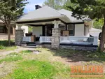 home-inspector-kansas-city-mo-5339-rockhill-rd-64110-39.02963250N-94.57561170W-bulldog-home-inspections-04-22-2025 Exterior photo of 100-year-old vacant investor property inspected at 5339 Rockhill Rd, Kansas City, MO 64110 (39.0296N, 94.5756W)