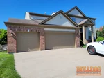 home-inspector-lenexa-ks-8720-dunraven-st-66227-38.96960640N-94.85786180W-bulldog-home-inspections-2025-05-05 Exterior photo of 20-year-old occupied 2-story home inspected at 8720 Dunraven St, Lenexa, KS 66227 (38.9696N, 94.8579W)