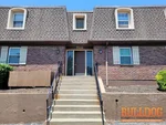 home-inspector-overland-park-ks-7618-w-59th-terr-apt-310-66202-39.02190710N-94.67623000W-bulldog-home-inspections-2025-06-09 Exterior photo of 54-year-old vacant condominium inspected at 7618 W 59th Terr, Apt 310, Overland Park, KS 66202 (39.0219N, 94.6762W)