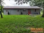 home-inspector-pleasanton-ks-6721-read-rd-66075-38.12039390N-94.74992890W-bulldog-home-inspections-2025-06-17 Exterior photo of 50-year-old occupied farmhouse inspected at 6721 Read Rd, Pleasanton, KS 66075 (38.1204N, 94.7499W)