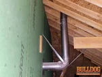 A photo of a fireplace flue with birds inside the attic of a 7-year-old 1.5-story home in the Watersedge subdivision of Overland Park, KS (38.8451N, 94.6235W)