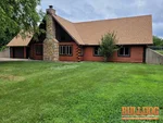 Full home inspection and termite inspection on a vacant 32-year-old 1.5-story earth contact home in the Cottonwood Square subdivision of Belton, MO (38.7549N, 94.5518W).
