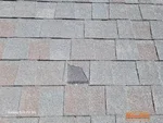 Hail damaged shingles on 29-year-old split-level home roof in Olathe, KS — 66062 (38.83444070N, 94.80165210W)