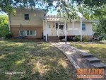 home-inspector-excelsior-springs-mo-620-highland-st-64024-39.33742530N-94.21929260W-bulldog-home-inspections-20250822_102805 Exterior of 70-year-old raised ranch in McGlothlins Addition subdivision of Excelsior Springs, MO — 64024 (39.3374N, 94.2193W)