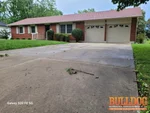 Exterior of 65-year-old ranch in Ridgeview Addition subdivision of Harrisonville, MO — 64701 (38.6518N, 94.3307W)