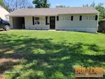 Exterior of 70-year-old ranch in Ruskin Heights subdivision of Kansas City, MO — 64134 (38.888328N, 94.499476W)
