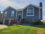 Exterior of 18-year-old split-level home inspected in Kansas City, MO — 64157 (39.30217510N, 94.47556530W)