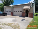home-inspector-peculiar-mo-355-trackside-dr-64078-38.71987270N-94.46346160W-bulldog-home-inspections-20250820_132348 Exterior of small vacant commercial building near W Center St. in Peculiar, MO — 64078 (38.7199N, 94.4635W)