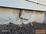 Exterior beam pocket failure from foundation movement at 13416 Belmead Ave in Wyatts subdivision of Grandview, MO — 64030 (38.8807N, 94.5186W)