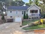 Exterior of 92-year-old bungalow in Westwood Park subdivision of Kansas City, MO — 64112 (39.0395N, 94.6063W)