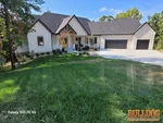 home-inspector-shawnee-ks-6419-hillside-st-66218-39.01116900N-94.80211700W-bulldog-home-inspections-20250912_103928 Exterior of 1-year-old 4200 sq.ft. home in Enchanted Lake Estates subdivision of Shawnee, KS — 66218 (39.0112N, 94.8021W)