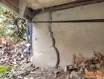 Large offset exterior settlement crack at the SE corner of a 1.5-story home in Marquette Blue Ridge subdivision of Raytown, MO — 64138 (38.9761N, 94.4885W)