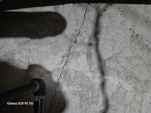 Vertical foundation cracks in crawlspace - Ashton at Charleston Park subdivision, Lee's Summit, MO - November 2025 - 29-year-old front-to-back split