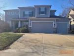 Exterior of 9-year-old 2-story home in Arbor Lake subdivision of Shawnee, KS — 66227 (38.9621N, 94.8765W)