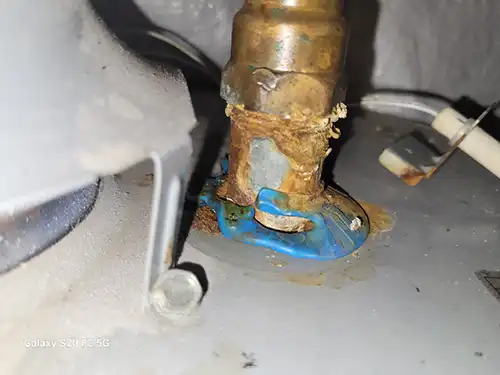 melted-heat-trap-shawnee-ks-9154-shady-bend-rd-66227-38.96209850N-94.87648130W-bulldog-home-inspections-20251212_151747 Melted heat trap at water line connection - Arbor Lake, Shawnee, KS - December 2025 - 9-year-old unit