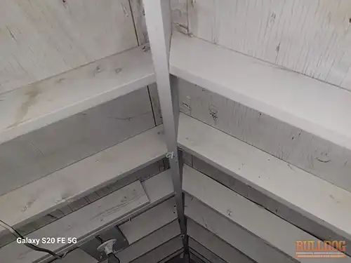 white-roof-ridge-attic-fire-damage-kansas-city-mo-8936-oak-st-64114-38.96537520N-94.58651870W-bulldog-home-inspections-20251223_135543 White-painted roof rafters in attic from fire damage - Moore's Southland subdivision, Kansas City, MO - 64114 (38.9654N, 94.5865W) - December 2024