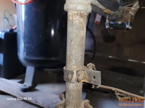 galvanized-water-line-close-up-independence-mo-1118-e-frederick-st-64050-39.09985470N-94.40040750W-bulldog-home-inspections-20260112_121418 Galvanized water line detail in South Orchard Home subdivision of Independence, MO — 64050 (39.09985470N, 94.40040750W)