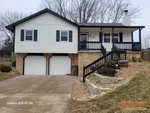 home-inspector-raymore-mo-310-n-darrowby-dr-64083-38.81199980N-94.48856710W-bulldog-home-inspections-20260105_101610 Exterior of 39-year-old raised ranch in Foxhaven subdivision of Raymore, MO — 64083 (38.8120N, 94.4886W)