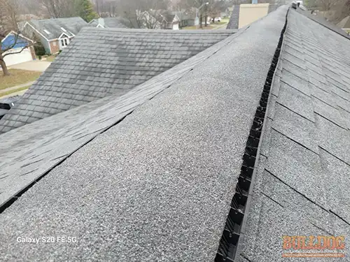 Old worn asphalt shingle roof in Foxhaven subdivision of Raymore, MO – 64083 (38.81199980N, 94.48856710W)