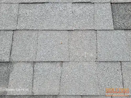 Old roof shingles in Foxhaven subdivision of Raymore, MO – 64083 (38.81199980N, 94.48856710W)